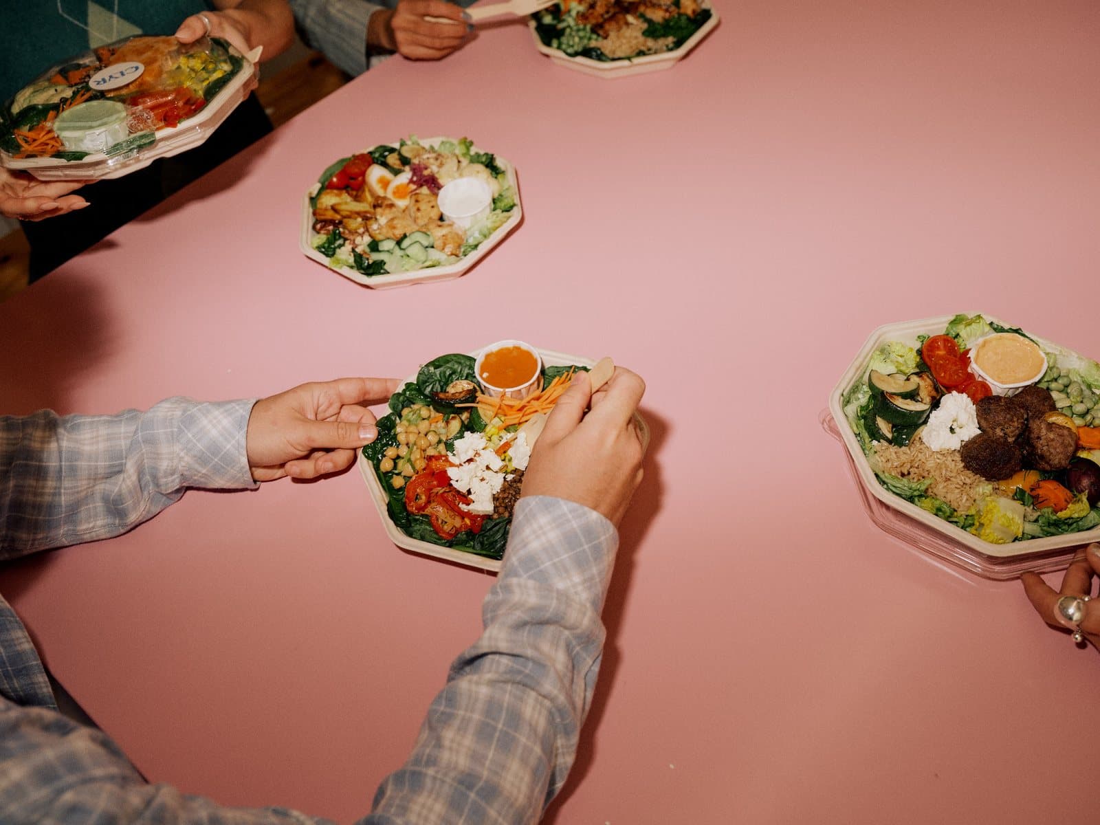 CLYR plates shared across a table