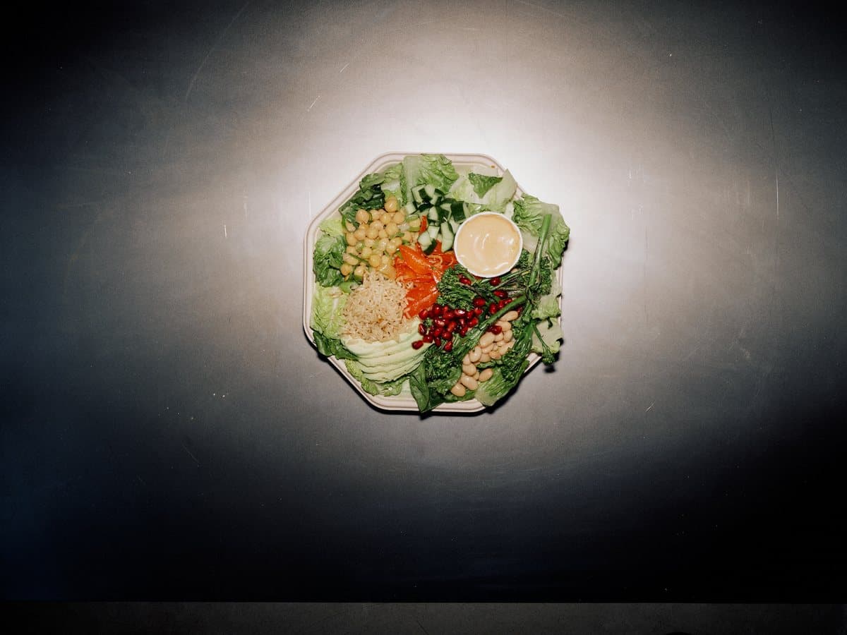 The Running Cheetah plate with chipotle orange chickpeas, avocado, broccoli, and pickled grapes